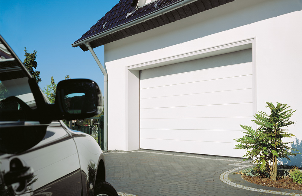 Automatic sectional garage door installation